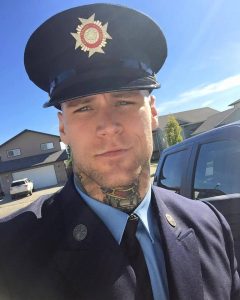 A Fire Marshall featured on the site http://www.hotmenwithtattoos.com