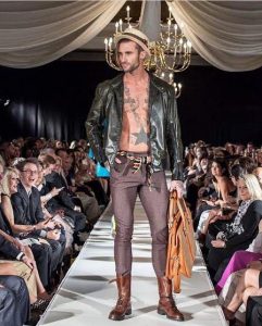 Blake Russell modeling at Charlotte Seen Fashion Show in Charlotte, NC